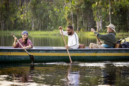 (From left to right): Expedition Leader Carla Perez, Will Smith and Professor of Toxicology Bryan Fry paddle through the water in the Ecuadorian rainforest.  (credit: National Geographic/Kyle Christy)