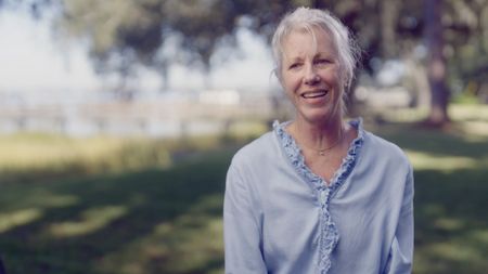 Lynda Brooks, contributor, describing to camera the moment she witnessed her husband, Gene Brooks being attacked by a shark whilst out swimming in the Wilmington River, NC. (National Geographic)