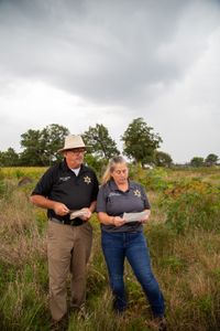 Coroner Scott McCord and Chief Deputy Heidi McCord return to the site where the body was discovered in 1983. (National Geographic/Tom Beard)