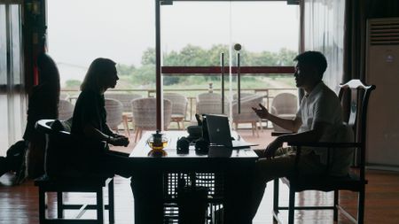 Mariana van Zeller interviews Mr. Hur in Yatai New City. (National Geographic)
