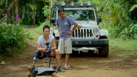 Albert Lin and Gus Kohler launch a drone. (National Geographic/Pete Allibone)