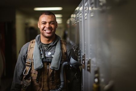 Student Captain Micah Nissly posing in the hallway on base. (Credit: National Geographic/Freddie Claire)