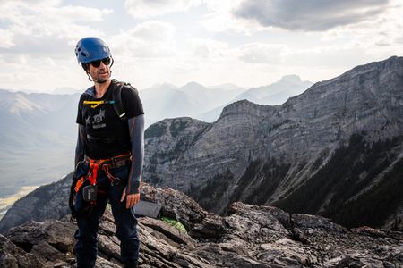 Joseph Fiennes poses for a portrait after scaling a sheer cliff-face at the Via Ferrata, British Columbia, Canada. Amidst mountains and whale watching, Sir Ranulph Fiennes and his cousin Joseph Fiennes reflect on Ran’s epic life and his new challenge of life with Parkinson’s. (National Geographic)