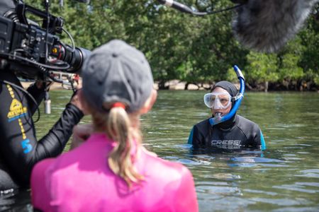 Cinematographer Rory McGuinness and Showrunner Colette Beaudry film with Algae octopus (Abdopus aculeatus) researcher, Dr. Crissy Huffard, in Bunaken Marine Park.  (photo credit: National Geographic/Annabel Robinson)