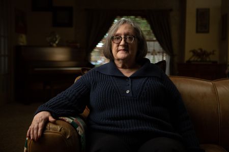Fran Ferrari is pictured in close-up portrait during the production of National Geographic's Oklahoma City Bombing: One Day In America. Ferrari was at work in the Journal Record building located across the street from the Alfred P. Murrah building and was seriously injured when the explosion shattered the large window in front of her desk. On April 19, 1995, America experienced the deadliest domestic terror attack in its history. Thirty years later, this series tells the story of that day told only by those who lived through it – the people of Oklahoma. (National Geographic/Brandon Widener)