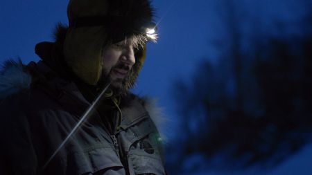 Chevie Roach checks his traps during the winter season. (BBC Studios/Dwayne Fowler)