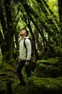 Coleford, UK - Albert Lin in a forest in Coleford, UK. (National Geographic/Hugh Campbell)