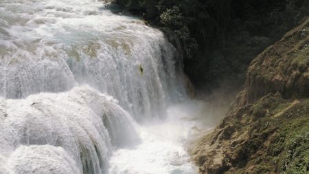 Evan Garcia kayaks down a waterfall on the Agua Azul river, in Mexico.  (mandatory photo credit: Rush Sturges / River Roots Productions)