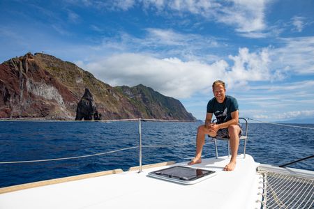 Bertie Gregory on board the boat the crew call home for the shoot.  (credit: National Geographic/Jeff Hester)