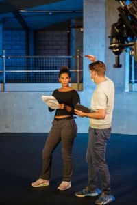 Diva Amon rehearsing with director Martin Cass at the studio lab shoot. (National Geographic/Aubrey Fagon)