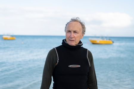 Dr. Roger Hanlon on the Great Barrier Reef, Australia.  (National Geographic for Disney/Craig Parry)
