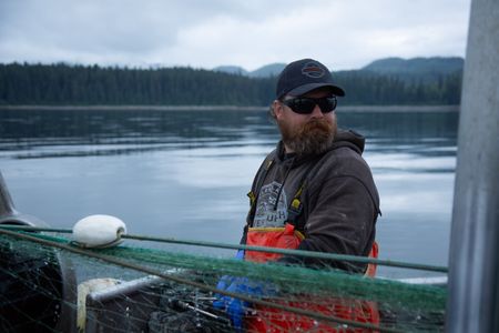Carl Hernandez fishes for salmon. (National Geographic/Lukas Taylor)