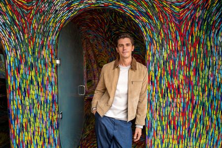 Antoni Porowski poses in an archway at Nido de Quetzalcoatl. (National Geographic/Jill Worsley)