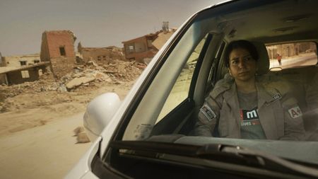 Hana Khidera rides in a car in Sinjar, Iraq. (Nobel Media/Jaimie Ackroyd)