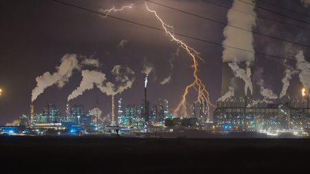 Secunda Power Plant in South Africa during a thunderstorm. (National Geographic)