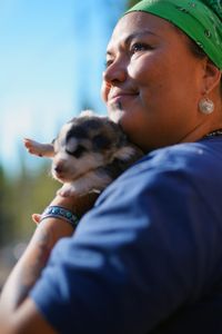 Jody Potts-Joseph with her puppies. (National Geographic/Ashton Hurlburt)