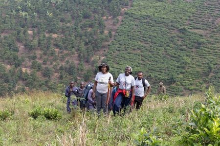 National Geographic Explorer Dr. Gladys Kalema-Zikusoka and her mountain gorilla team on location in Bwindi Impenetrable National Park. (National Geographic/Martha Mutiso)