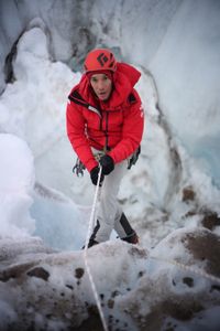 Alex Honnold descends into a moulin. (photo credit: National Geographic/JJ Kelley)