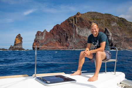 Bertie Gregory on board the boat the crew call home for the shoot.  (credit: National Geographic/Jeff Hester)