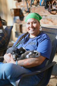 Jody Potts-Joseph with her puppies. (National Geographic/Ashton Hurlburt)