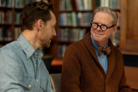 Tom Hiddleston and Professor Steven Tuck discuss the archaeological record from Pompeii. (National Geographic/Christian Black)