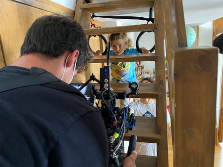 Cinematographer Alfredo DeJuan films Gerd Serrasolses and his son Riu Serrasolses.  (National Geographic/Gene Gallerano)