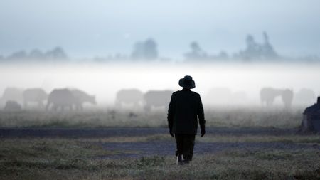 Zacharia Mutai, a  head keeper at the Ol Pejeta Conservancy who helps take care and protect Najin and Fatu, the last two remaining Northern White Rhinos in the world. (credit: National Geographic)