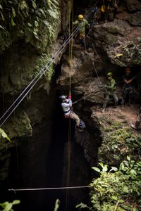 Will Smith descends 206 feet into La Cueva de los Tayos as they go to search for new life. (credit: National Geographic/Kyle Christy)