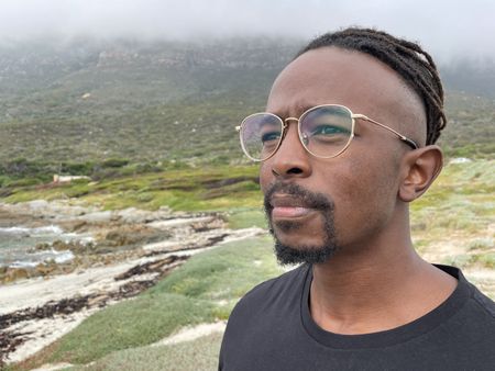 Gibbs Nuguru looking out to the beach. (National Geographic/Robert Cowling)