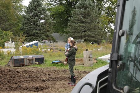 Beth Pol and Abigail Pol come to check on the status of the old barn the family is taking down to transport and restore at the Pol family's farm. (National Geographic)