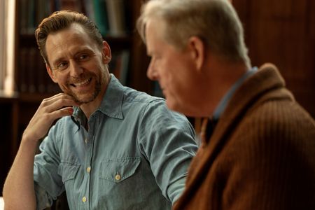 Tom Hiddleston and Professor Steven Tuck discuss the archaeological record from Pompeii. (National Geographic/Christian Black)