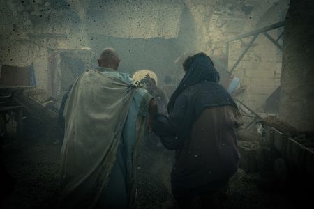 Pompeii civilians try to escape the city as thick volcanic ash rains from the sky. (National Geographic/Darrin Zammit Lupi)