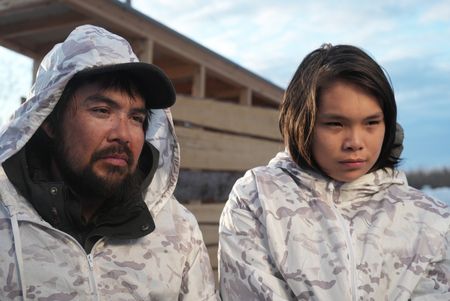Tig Strassburg on a migratory bird hunt with his son, Evan. (National Geographic/Pat Henderson)