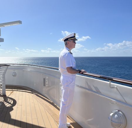 Captain Marco prepares to take the helm of the Disney Treasure. (credit: National Geographic/Jenn Brehm)