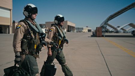 Student Lt Carissa Meinster with an instructor ahead of her next test. (Credit: National Geographic)