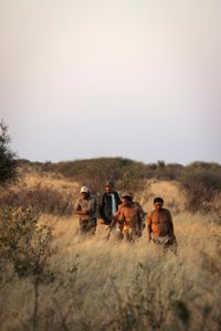 Will Smith and San Bushman Guide Kane Motswana follow the San people through the Kalahari Desert searching for food.   (credit: National Geographic/Kyle Christy)