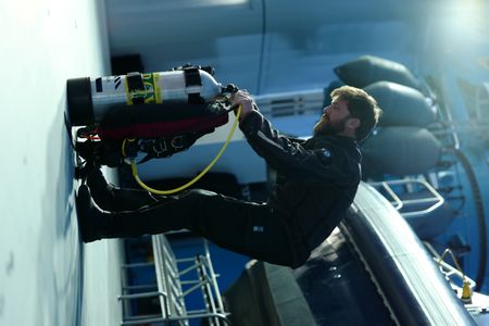 Aldo Kane gears up for a dive. (National Geographic/Mario Tadinac)