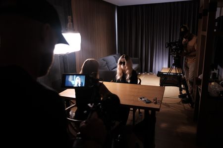 Mariana van Zeller interviews Angel, a scam compound model in Mae Sot, Thailand. (National Geographic)