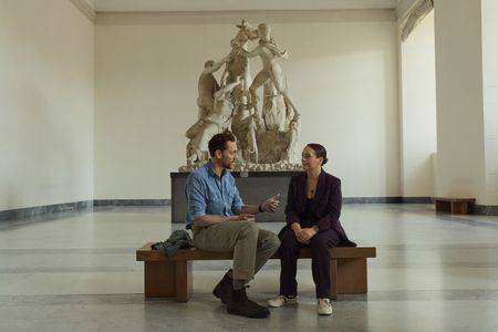 Tom Hiddleston and Dr. Sarita Robinson discuss the history of Pompeii from inside the National Archaeological Museum of Naples. (National Geographic/Paolo Verzone)