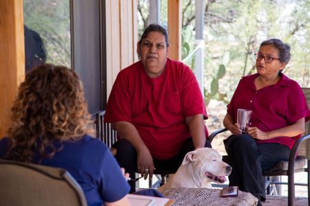 Stephanie Bourgeois, Crime Scene Technician, Apache Junction PD, meets with Debbie Thompson and Anastasia Casillas, extended family of Jane Doe. (National Geographic/Tom Beard)
