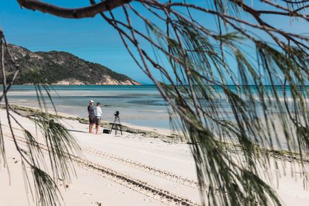 Cinematographer, Rory McGuinness, and director / cinematographer, Adam Geiger, filming landscape imagery on the Great Barrier Reef, home of the Day octopus (Octopus cyanea).  (photo credit: National Geographic/Harriet Spark)