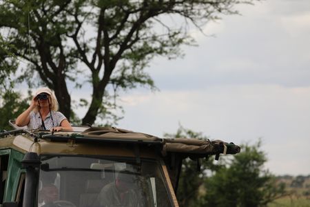 Producer and Director Sally Thomson searches for the herds. (National Geographic for Disney/Sally McLennan)