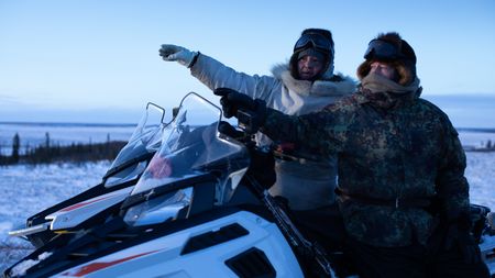 Chip and Agnes Hailstone hunt caribou while a herd migrates through their area. (BBC Studios Reality Productions, LLC/Ashton Hurlburt)