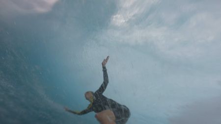 Justine Dupont surfs inside the tube of a giant wave.  (Mandatory photo credit: Justine Dupont)