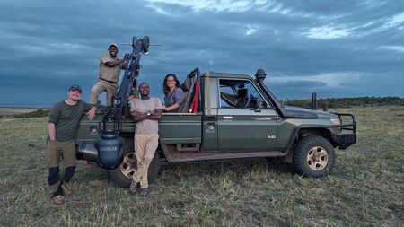 Series Producer Jane Atkins sits in the back of the GSS vehicle alongside other members of the film crew. (National Geographic/Jane Atkins)