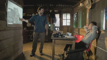 Santiago  Giraldo discussing the LiDAR results with Albert Lin. (National Geographic)
