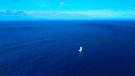 The crew boat on the water. (credit: National Geographic/Bertie Gregory)