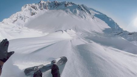 Point of view of Travis Rice as he snowboards on a mountain in Alaska.  (photo credit: Travis Rice, Inc)