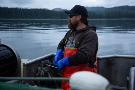 Carl Hernandez fishes for salmon. (National Geographic/Lukas Taylor)
