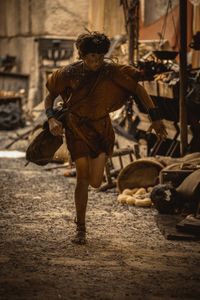Avianius, played by Frankie Treadaway, sprints through the streets of Pompeii, desperately running to escape the pyroclastic flow. (National Geographic/Darrin Zammit Lupi)